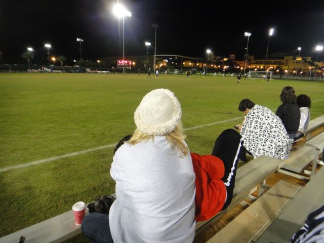 Cheryl and Chapin bundled up on New Year's Eve 2011 watching Katie's soccer game.