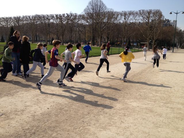 school gym class in the shadow of the Eiffel Tower french gym class