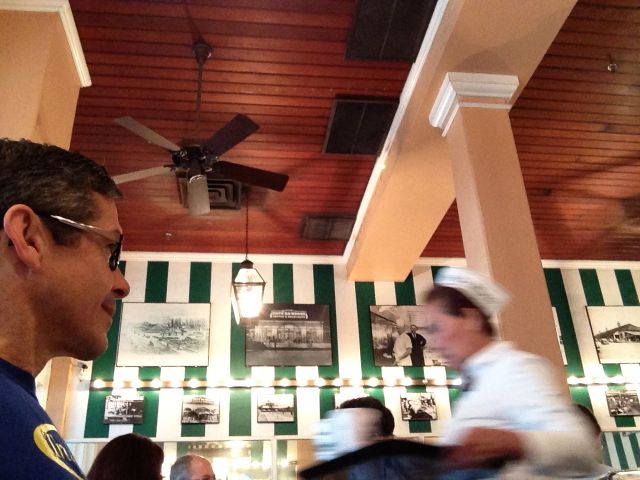 waiting for the friendly waitress to take my breakfast order at Cafe Du Monde waiting for the friendly waitress to take my breakfast order at Cafe Du Monde
