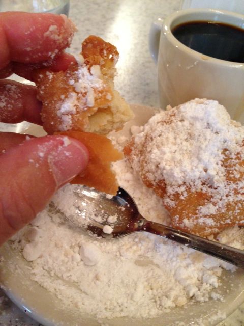 beignets and coffee at Cafe Du Monde in New Orleans French Quarter