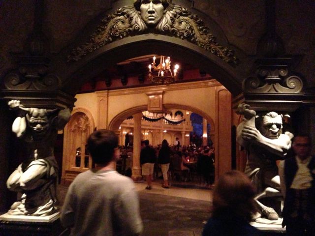photo of Be Our Guest Restaurant entrance at night