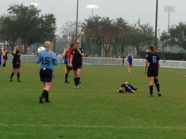 Youth soccer player injured down on the field