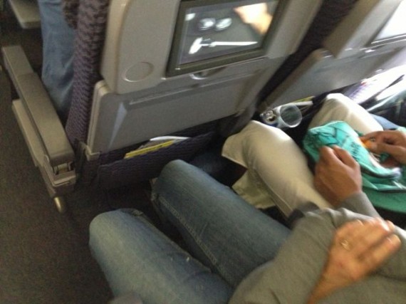 Photo of actual leg room in United economy seat