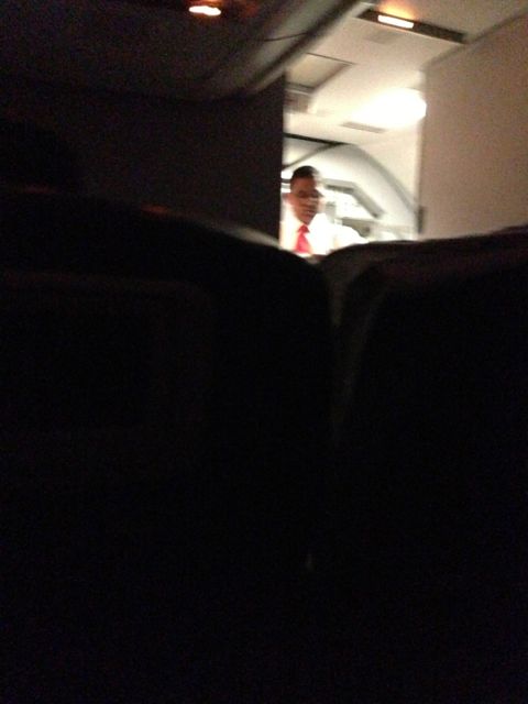 Noise, bright light, poor recline, and two prior flights made the red eye an unhealthy choice