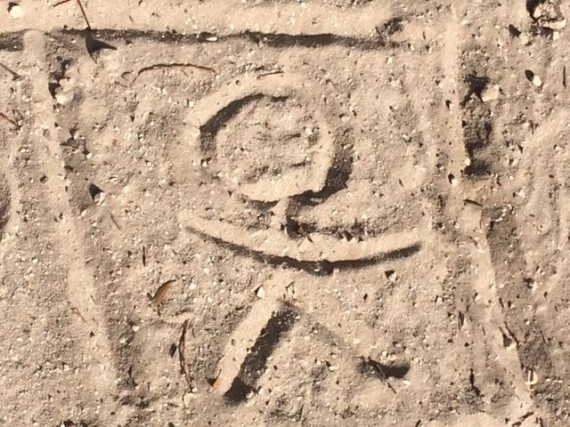 Mid Life Celebration logo drawn in sand