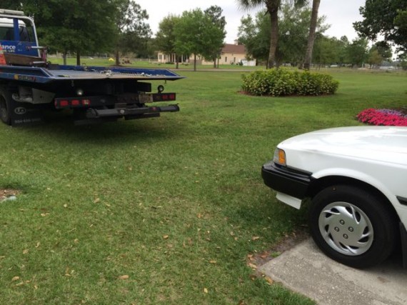 AAA tow truck about to tow 1990 Toyota Camry