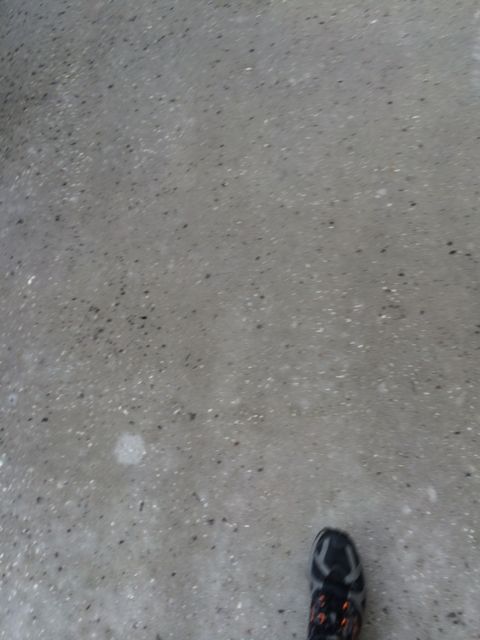 random foot on sidewalk photo