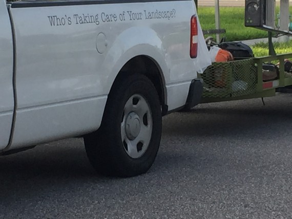 Landscape truck with company tagline