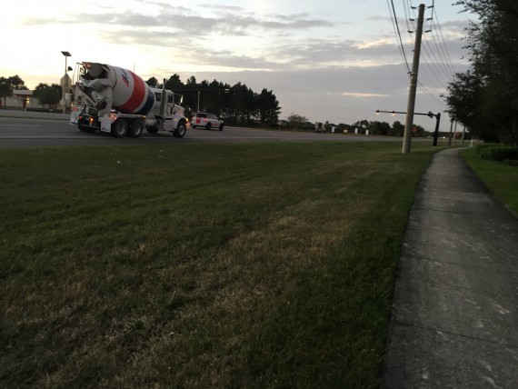 white, red, and blue cement truck
