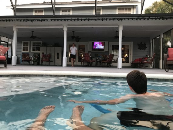 watching movie from pool