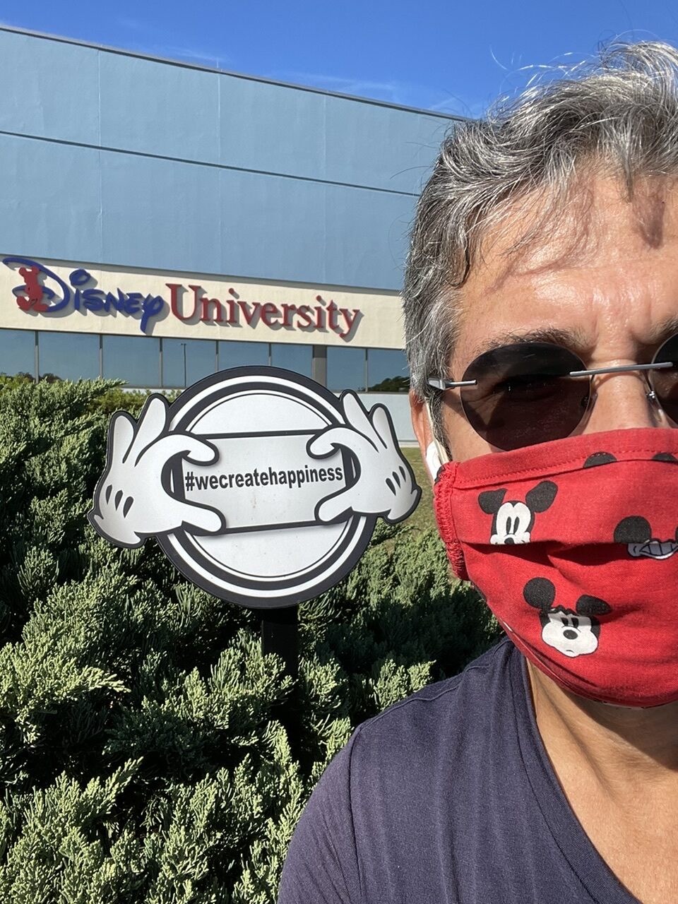 Man in a facemask at Disney University