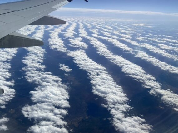 Lined clouds from jet