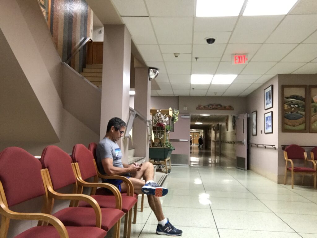 Disney author Jeff Noel writing from a nursing home lobby