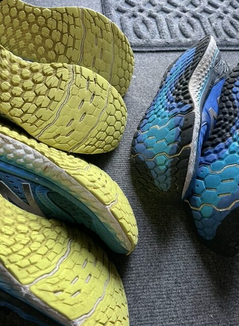 pile of old running shoes