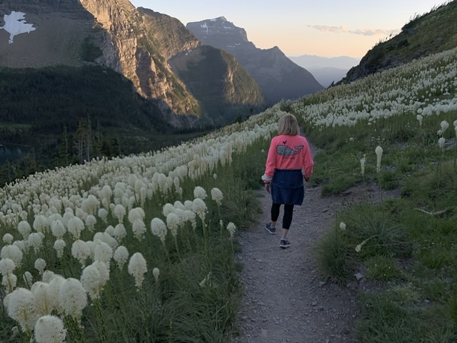 woman hiking on mountain trail