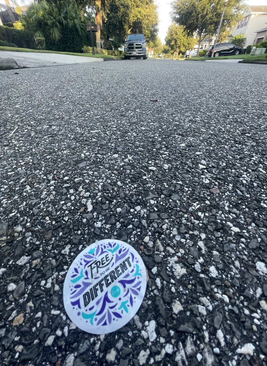 Sticker on a  Residential street