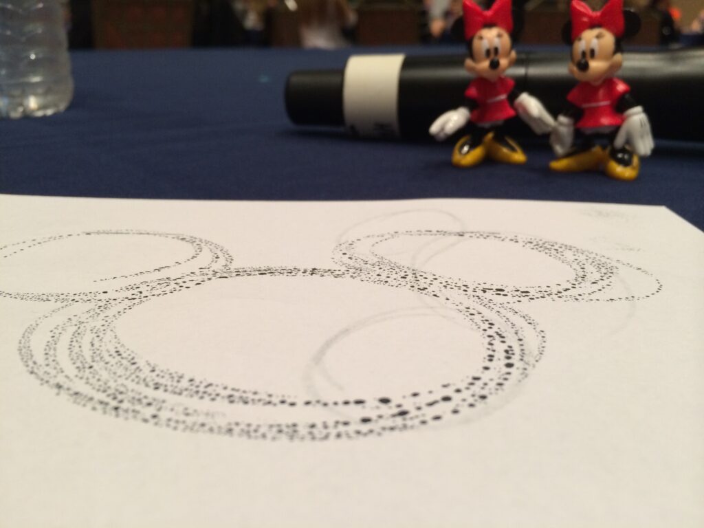 Mickey Mouse head drawn on aper
