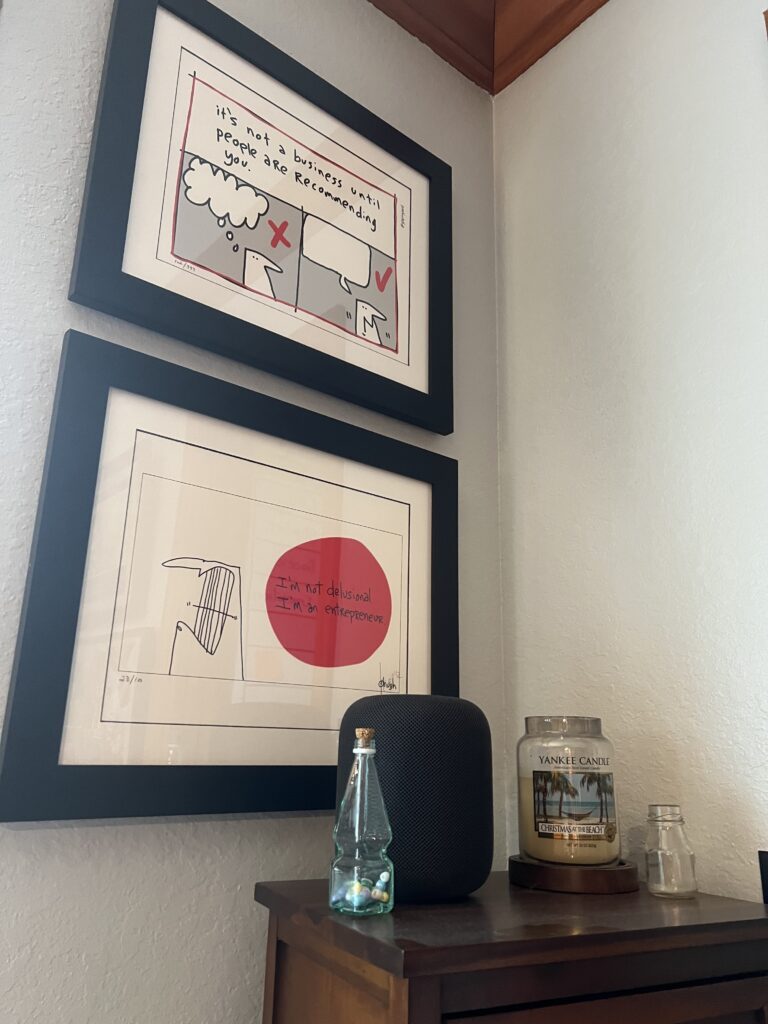 Framed business quotes on wall