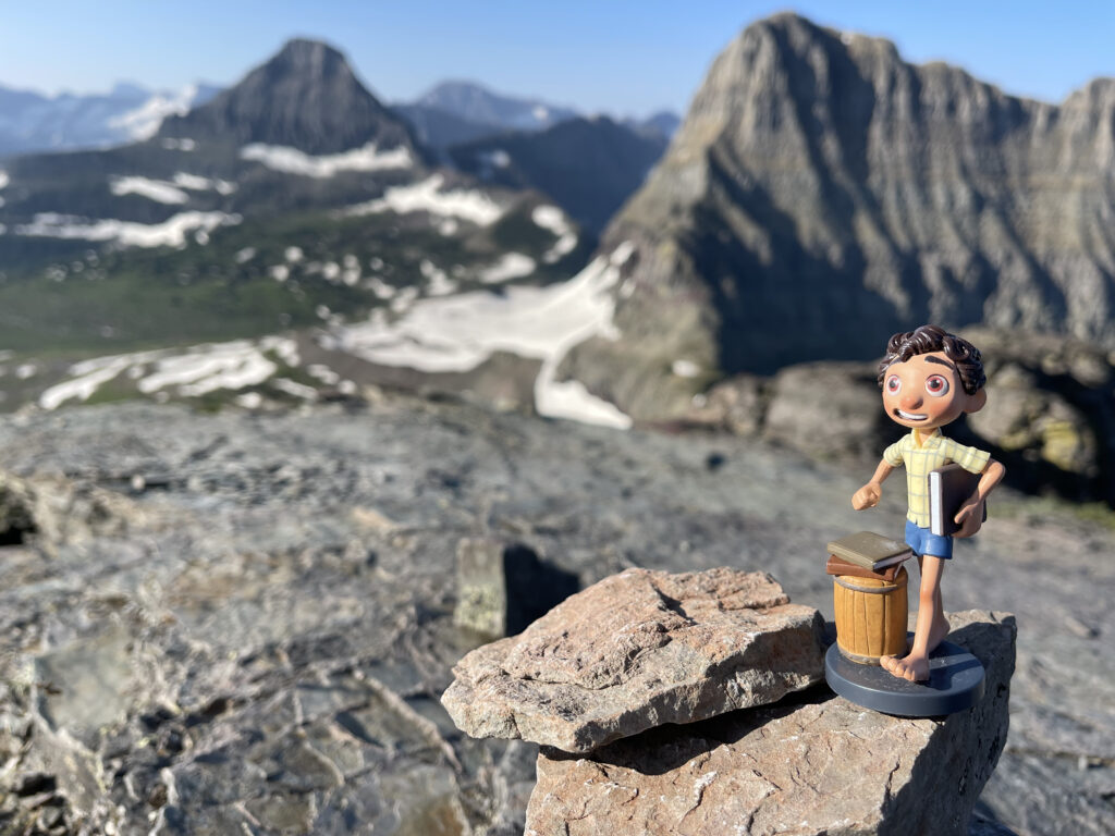 Mountains and a small Pixar toy