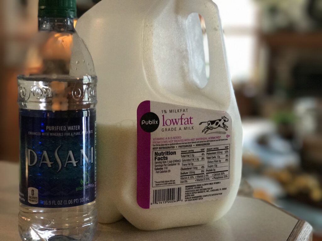 bottle of water and jug of milk