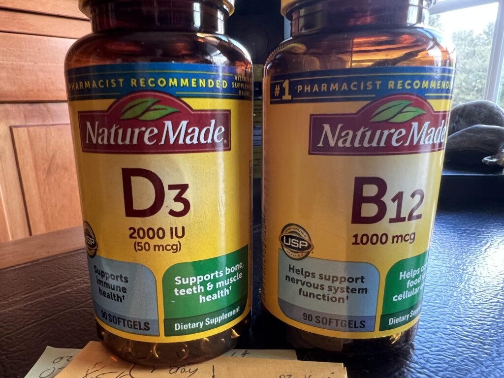 two vitamin bottles