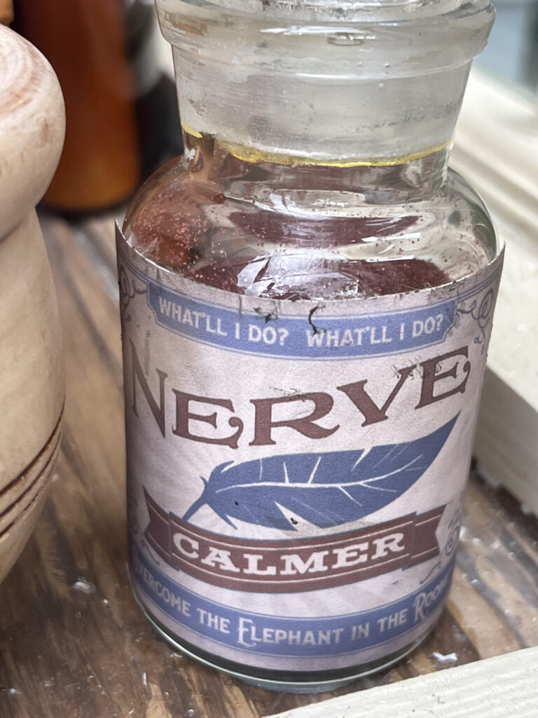 Disney Park window display closeup of a funny bottle label