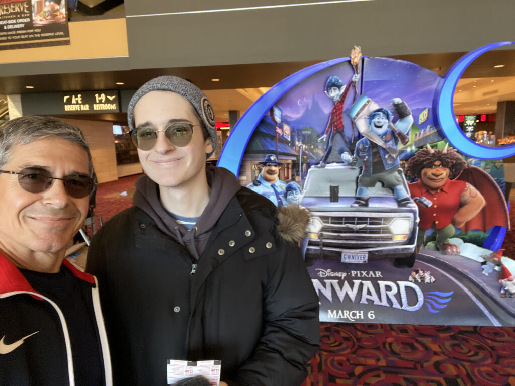 two men at movie theater