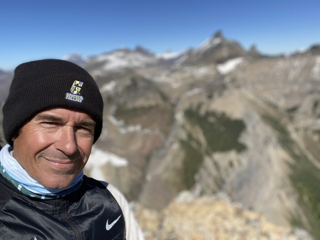 Solo hiker on a mountaintop
